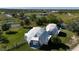 Aerial view of dome house near a waterway at 15871 Huffmaster Rd, North Fort Myers, FL 33917