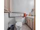 Small bathroom with toilet, sink, and vanity at 15871 Huffmaster Rd, North Fort Myers, FL 33917