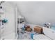 Bathroom with shower, toilet, and shelving at 15871 Huffmaster Rd, North Fort Myers, FL 33917