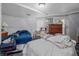 Upstairs bedroom with two beds and ample closet space at 15871 Huffmaster Rd, North Fort Myers, FL 33917