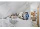 Main bedroom with large bed and ensuite bathroom at 15871 Huffmaster Rd, North Fort Myers, FL 33917