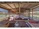 Interior view of a chicken coop with several chickens at 15871 Huffmaster Rd, North Fort Myers, FL 33917