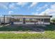 Long chicken coop with screened sides at 15871 Huffmaster Rd, North Fort Myers, FL 33917