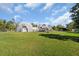 Full view of the unique dome house and yard at 15871 Huffmaster Rd, North Fort Myers, FL 33917