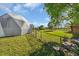 Home's side view, showcasing the backyard at 15871 Huffmaster Rd, North Fort Myers, FL 33917