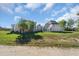 View of the home's unique architectural design at 15871 Huffmaster Rd, North Fort Myers, FL 33917