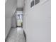 Hallway leading to additional rooms at 15871 Huffmaster Rd, North Fort Myers, FL 33917