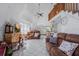Open living room with high ceilings and loft area at 15871 Huffmaster Rd, North Fort Myers, FL 33917