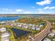 Aerial view of community near lake and conservation area at 16224 Laurel Oak Ln, Punta Gorda, FL 33982