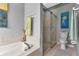 Bathroom with walk-in shower and soaking tub at 1636 Palace Ct, Port Charlotte, FL 33980