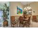 Dining room with tropical decor and wood furniture at 1636 Palace Ct, Port Charlotte, FL 33980