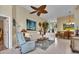 Spacious living room with comfortable seating, large artwork and tile floors at 1636 Palace Ct, Port Charlotte, FL 33980