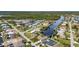 Aerial view of canal-front homes and lush landscape at 17032 Ohara Dr, Port Charlotte, FL 33948