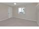 Spacious bedroom with ceiling fan and closet at 18514 Goodman Cir, Port Charlotte, FL 33948