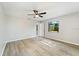 Spacious bedroom with large window and ceiling fan at 21047 Baffin Ave, Port Charlotte, FL 33954