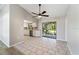 Open dining area adjacent to kitchen with backyard access at 21047 Baffin Ave, Port Charlotte, FL 33954