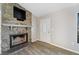 Stone fireplace with a built-in entertainment center at 21047 Baffin Ave, Port Charlotte, FL 33954