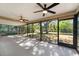 Spacious screened porch overlooking backyard at 21047 Baffin Ave, Port Charlotte, FL 33954