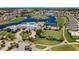 Community clubhouse with pool, tennis courts, and other amenities at 24415 Buckingham Way, Punta Gorda, FL 33980