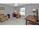 Home office with built-in desk and ample space at 24415 Buckingham Way, Punta Gorda, FL 33980