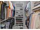 Large walk-in closet with shelving and ample hanging space at 24415 Buckingham Way, Punta Gorda, FL 33980