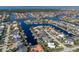 Stunning aerial showcasing a canal-front home and neighborhood at 2501 Rio Largo Ct, Punta Gorda, FL 33950