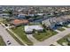 Aerial view of single-story home with canal access and lush landscaping at 2501 Rio Largo Ct, Punta Gorda, FL 33950