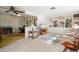 Living room with built-in shelving, comfortable seating and large windows at 2501 Rio Largo Ct, Punta Gorda, FL 33950