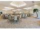 Large community hall with tables and chairs at 2514 Oswego Dr, North Port, FL 34289