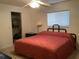 Bedroom with a queen-size bed and ceiling fan at 25200 Derringer Rd, Punta Gorda, FL 33983