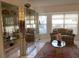 Bright living room with ample natural light and comfortable seating at 25200 Derringer Rd, Punta Gorda, FL 33983