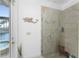 Large walk-in shower with glass enclosure and tiled walls at 3112 Tripoli Blvd, Punta Gorda, FL 33950
