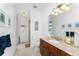 Well-lit bathroom with single vanity and granite countertop at 3112 Tripoli Blvd, Punta Gorda, FL 33950