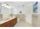 Spacious bathroom with double vanity and granite countertop at 3112 Tripoli Blvd, Punta Gorda, FL 33950