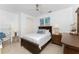 Guest bedroom with a double bed and wood furniture at 3112 Tripoli Blvd, Punta Gorda, FL 33950