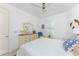 Comfortable bedroom with queen bed, dresser, and coastal decor at 3112 Tripoli Blvd, Punta Gorda, FL 33950