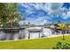 Private boat lift and canal access with lush landscaping at 3112 Tripoli Blvd, Punta Gorda, FL 33950