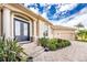 House entrance with double doors, stone steps, and lush landscaping at 3112 Tripoli Blvd, Punta Gorda, FL 33950