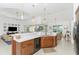 Spacious kitchen island with breakfast bar and views into Gathering room at 3112 Tripoli Blvd, Punta Gorda, FL 33950