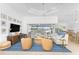 Bright living room with comfortable sofas and water views at 3112 Tripoli Blvd, Punta Gorda, FL 33950