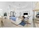 Bright living room with comfortable sofas and water views at 3112 Tripoli Blvd, Punta Gorda, FL 33950