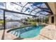 Enclosed pool and spa with canal view at 3112 Tripoli Blvd, Punta Gorda, FL 33950