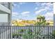 Enjoy scenic views from this condo's balcony, overlooking lush landscaping and neighboring buildings at 43010 Greenway Blvd # 236, Punta Gorda, FL 33982