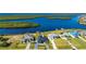 Waterfront home with access to canals and lush landscaping at 5117 Collingswood Blvd, Port Charlotte, FL 33948