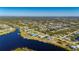 Single Gathering home in a quiet residential neighborhood by the water at 5117 Collingswood Blvd, Port Charlotte, FL 33948