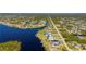 Single-Gathering home situated on a canal with neighborhood views at 5117 Collingswood Blvd, Port Charlotte, FL 33948