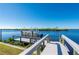 Private boat dock with access to open water, perfect for boating and enjoying waterfront activities at 5117 Collingswood Blvd, Port Charlotte, FL 33948
