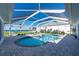 Enjoy this kidney shaped pool and spa with screened enclosure at 5117 Collingswood Blvd, Port Charlotte, FL 33948
