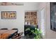 Built-in wet bar with shelving and dark cabinetry at 5117 Collingswood Blvd, Port Charlotte, FL 33948