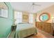 Cozy bedroom with ample light and built-in dresser at 6510 Kimlinda Ln, Sarasota, FL 34243